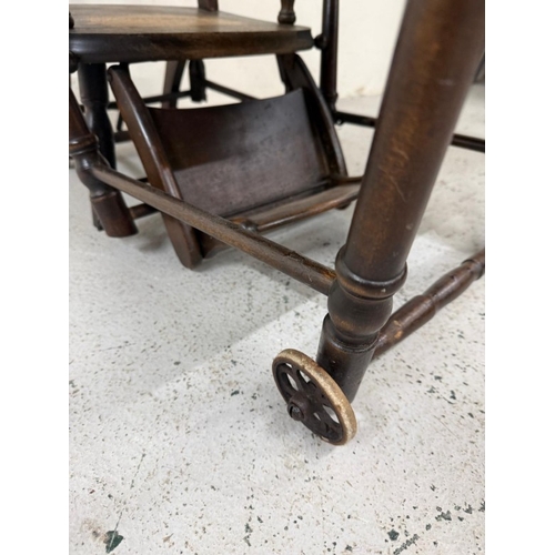 184 - An Edwardian oak metamorphic child's high chair converting to a play chair