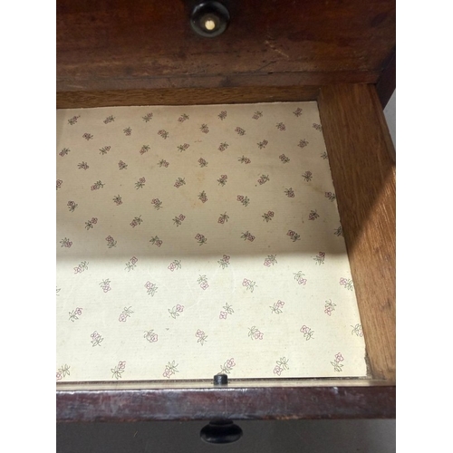 187 - An Apprentice piece or similar Chest of Drawers on bun feet with ebonised handles. Height 29.5cm x W... 