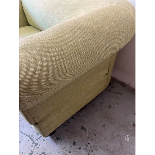 188 - Two seater sofa with drop sides in lime H69cm W164cm D88cm