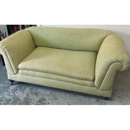 188 - Two seater sofa with drop sides in lime H69cm W164cm D88cm