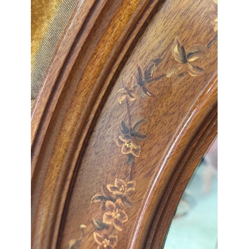 198 - A circular bevel-edged overmantel mirror, the surrounding frame upholstered in mustard yellow velvet... 