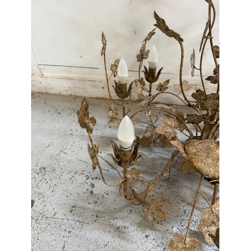 203 - A six arm decorative chandelier with a leaf theme. AF Height 84cm
