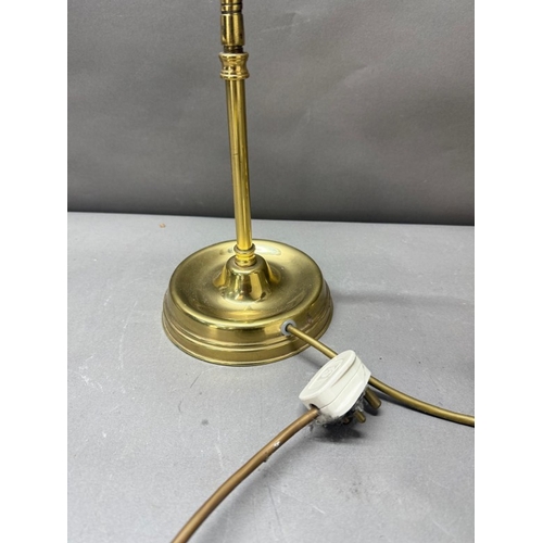 212 - Two brass swan neck desk lamps, one with scallop shell shade