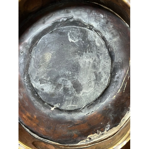 215 - Artisan cooper lamp with scrolling handles, unsigned