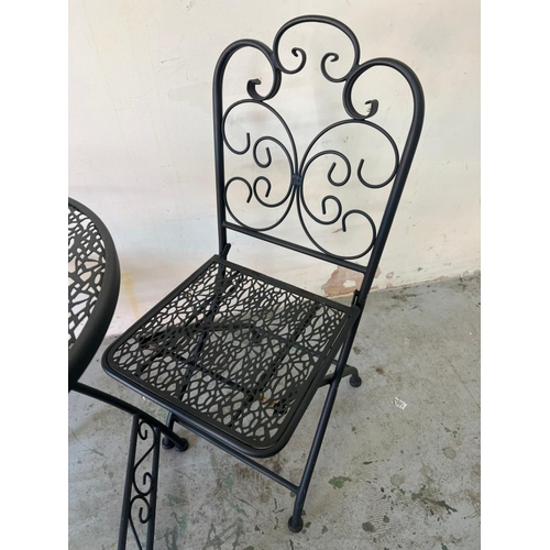 221 - Metal bistro set with folding table  and two chairs