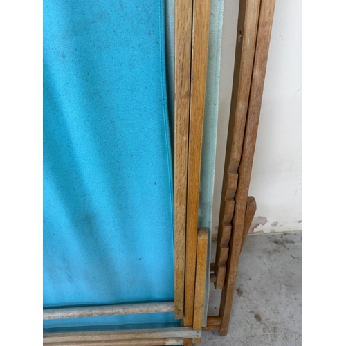 227 - Four vintage deck chairs in green and blues