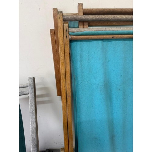 227 - Four vintage deck chairs in green and blues