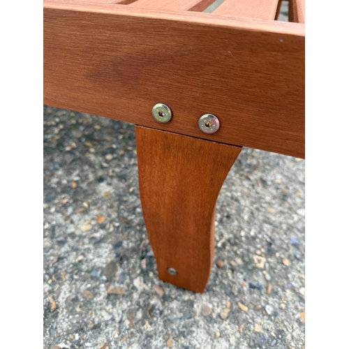 231 - A pair of John Lewis sun loungers with a side table