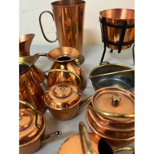 234 - A collection of miniature copperware