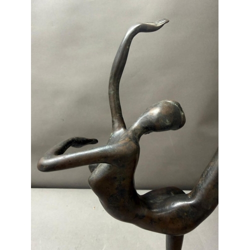 245 - A contemporary bronze style metal figure of a ballerina, approximate height 43.5cm