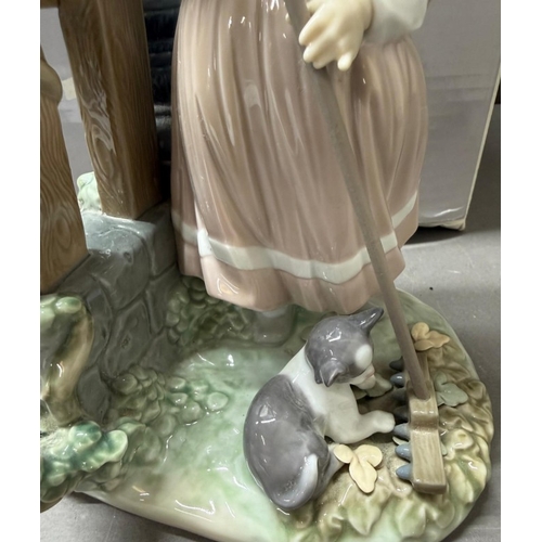 246 - Lladro 'Fall Clean Up' porcelain figurine designed by Jose Roig, retired 2007 from the Four Seasons ... 