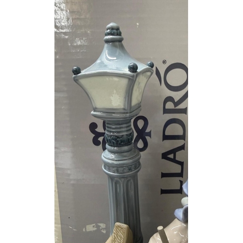 246 - Lladro 'Fall Clean Up' porcelain figurine designed by Jose Roig, retired 2007 from the Four Seasons ... 