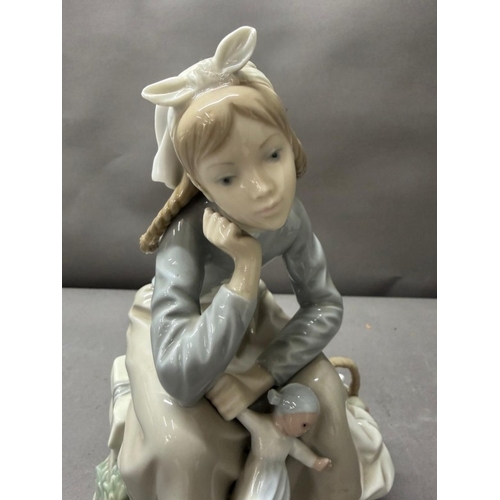 257 - Lladro porcelain figure 'Girl with Doll' model number 1211 by Antonio Ballester, retired 1994.