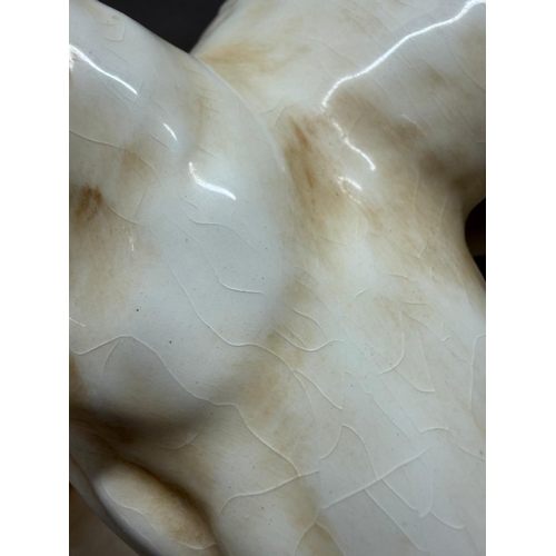 259 - A large Royal Dux eagle, circa 1920 with some damage wing tip present but in need of repair. Height ... 