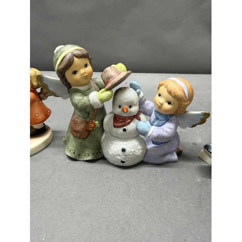 261 - A selection of four Hummel figures various years and themes.
