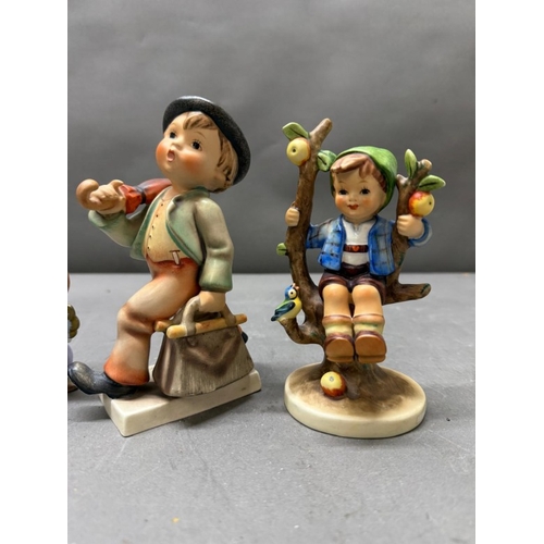 261 - A selection of four Hummel figures various years and themes.