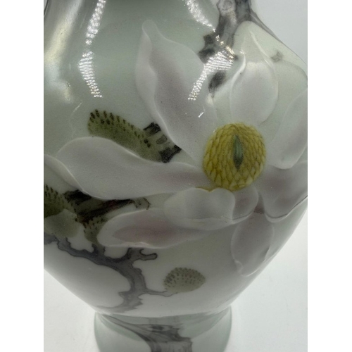262 - A Japanese vase, with floral decoration, marked in underglaze blue to base Height 27.5cm
