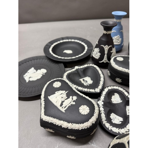 264 - A quantity of Wedgewood Jasperware in black and white and blue and white to include pin dishes and v... 