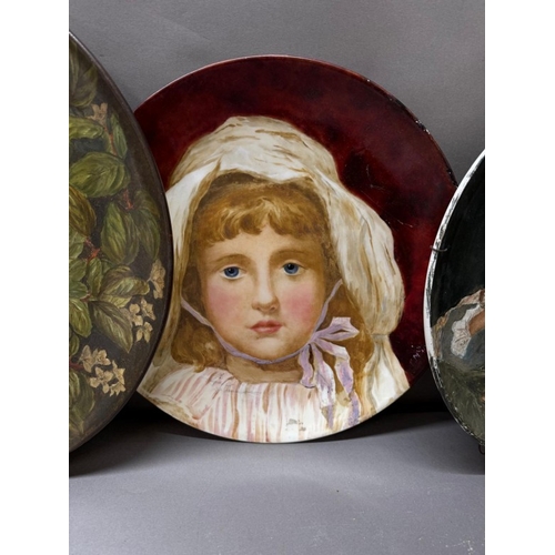 269 - A selection of four painted portrait plates by various malers and styles