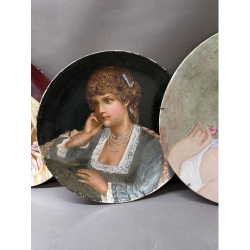 269 - A selection of four painted portrait plates by various malers and styles
