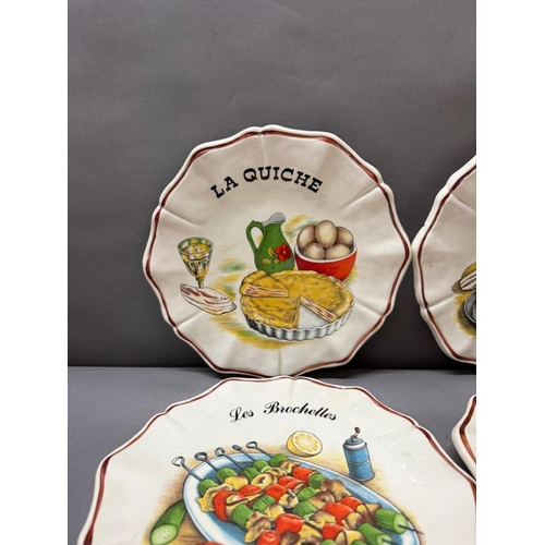 273 - Four Limador decorative plates featuring various dishes