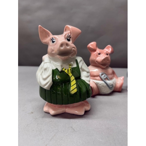 274 - Four vintage Nat West piggy banks