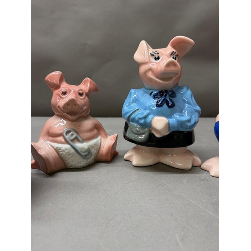 274 - Four vintage Nat West piggy banks