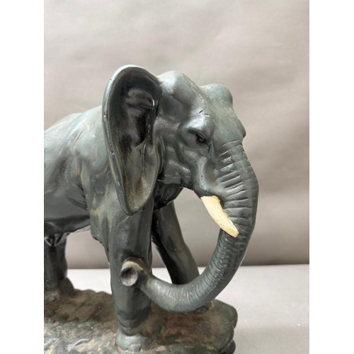 278 - A painted plaster model of an elephant H39cm