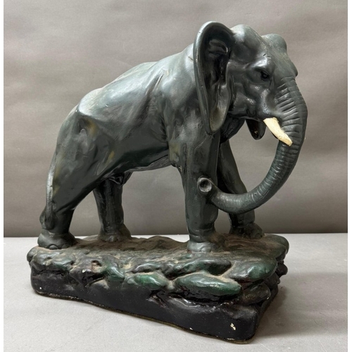 278 - A painted plaster model of an elephant H39cm