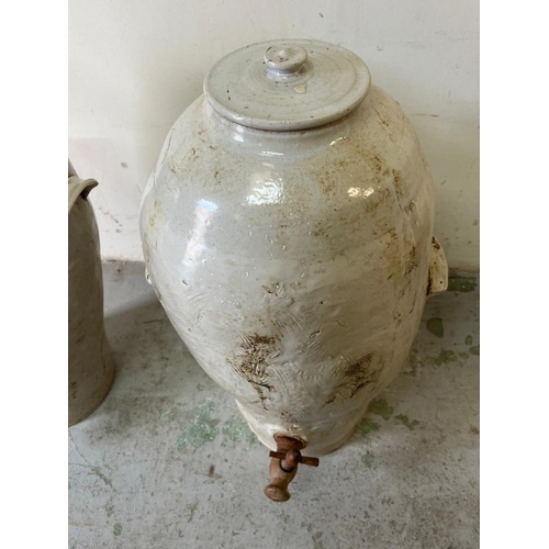 283 - A pair of stoneware jars, white glazed with side handles, wooden tops for dispensing AF