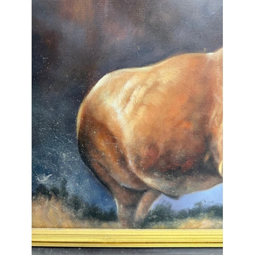 369 - A printed impressive contemporary picture of a stag, black ebonised frame. 94cm sq.