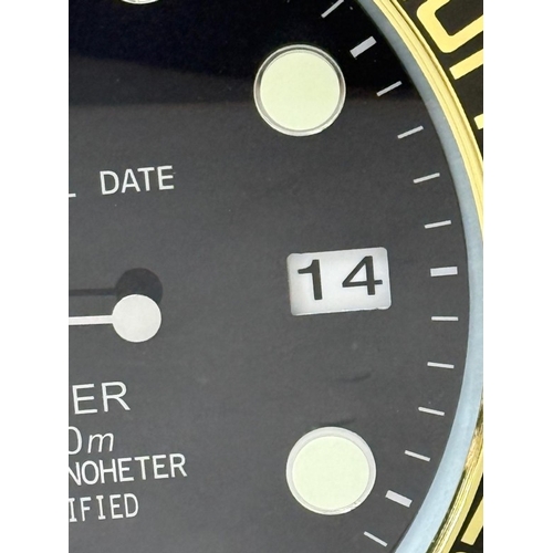 374 - A Rolex-style dealer display metal wall clock with sweeping motion  Dia34cm