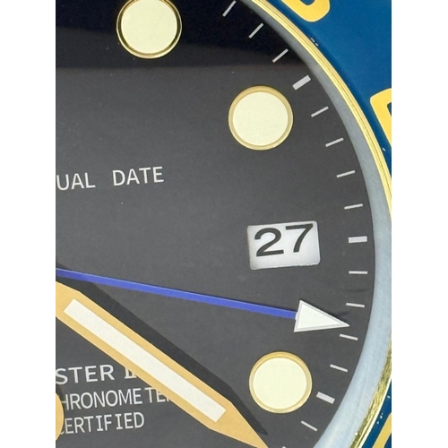 375 - A Rolex-style dealer display metal wall clock with sweeping motion  Dia34cm