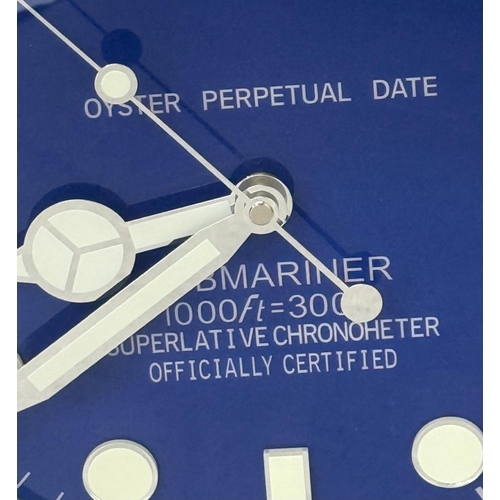 377 - A Rolex-style dealer display metal wall clock with sweeping motion t Dia34cm