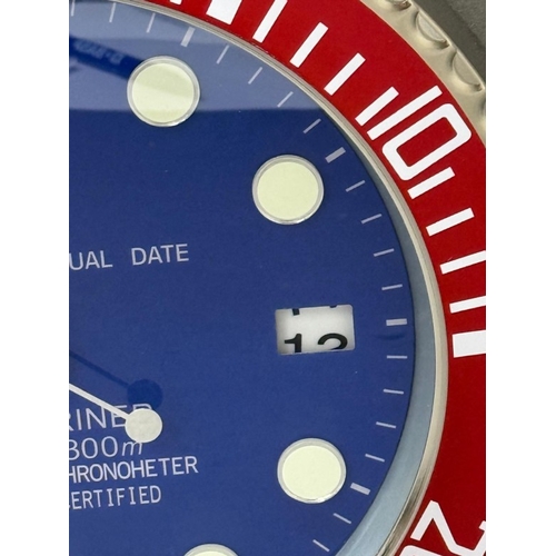 377 - A Rolex-style dealer display metal wall clock with sweeping motion t Dia34cm