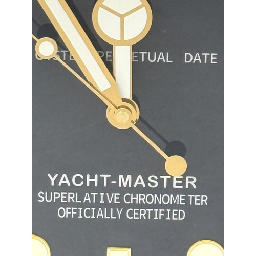 378 - A Rolex-style dealer display metal wall clock with sweeping motion  Dia34cm