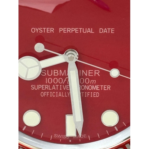 379 - A Rolex-style dealer display metal wall clock with sweeping motion  Dia34cm