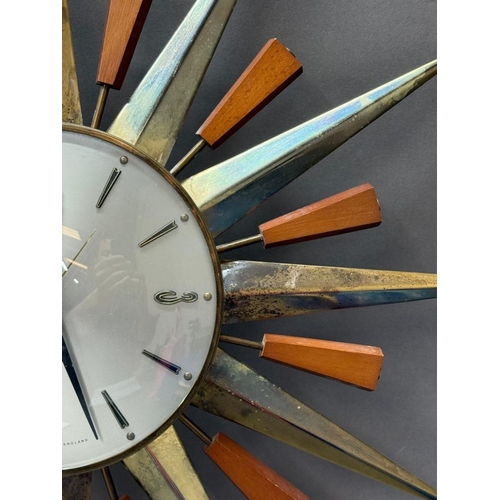 381 - A Mid Century metamck starburst wall clock
