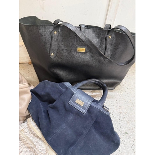 384 - A selection of bags and handbags various makers to include: Russell and Bromley, Cavalli and Ralph L... 