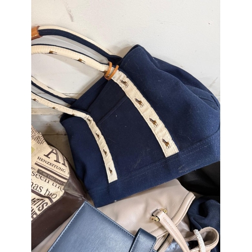 384 - A selection of bags and handbags various makers to include: Russell and Bromley, Cavalli and Ralph L... 