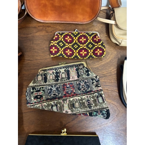 386 - A selection of various different hand bags to include two leather shoulder bags with a classic sligh... 