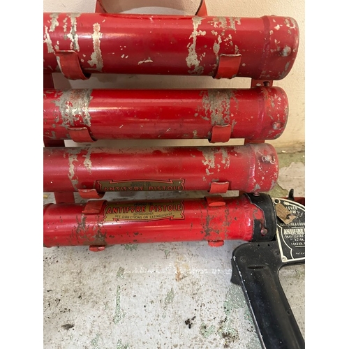 397 - An ESSO lubrication pump with a vintage antifire pistol fire extinguisher