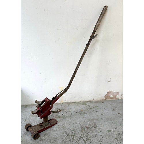 398 - A vintage red car jack