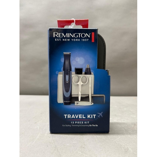 142 - A mens Remington travel kit