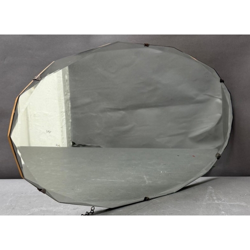 148 - An Edwardian twelve-sided wall hanging mirror