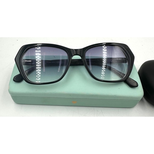 16 - A pair of Ray Ban rimless glasses and a pair of Tom Archer sunglasses