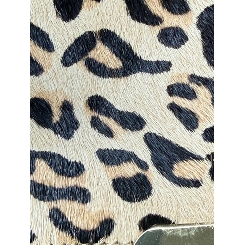 168 - A faux leopard skin purse by Biba or London
