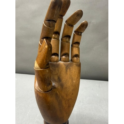 171 - A wooden ornamental adjustable artist's hand