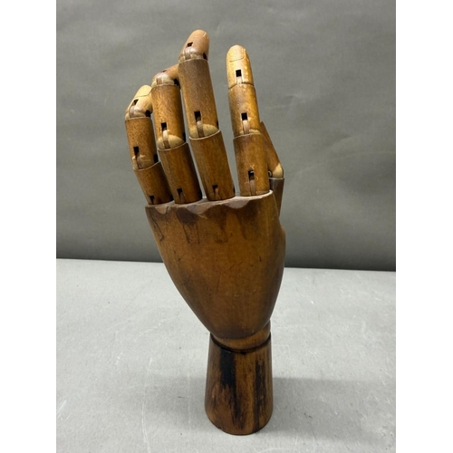 171 - A wooden ornamental adjustable artist's hand