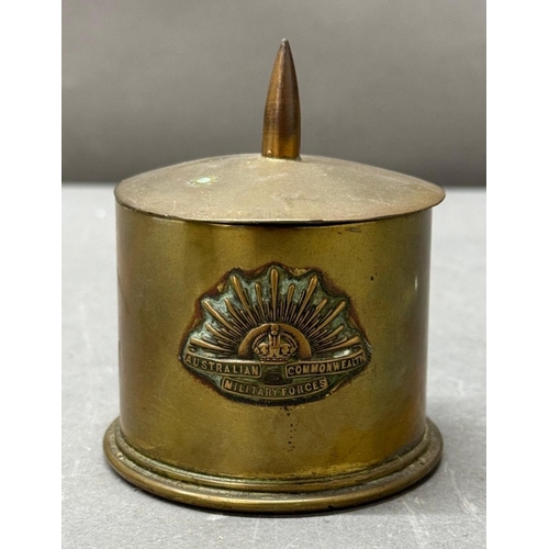 175 - A trench Art brass shell case converted into a lidded pot and embossed with the crest of the Austral... 